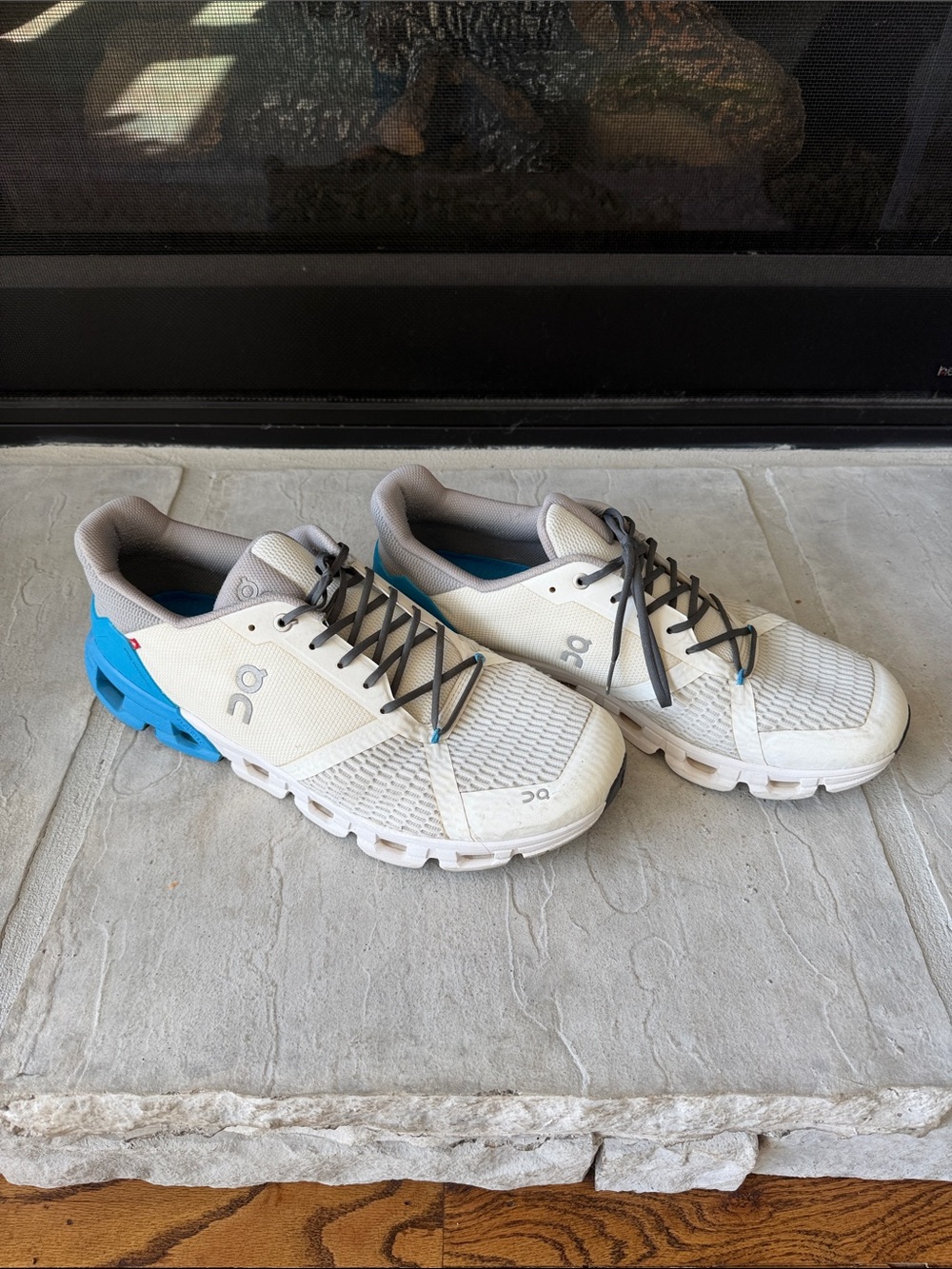On Running Men’s Sneakers in White with Blue Accents